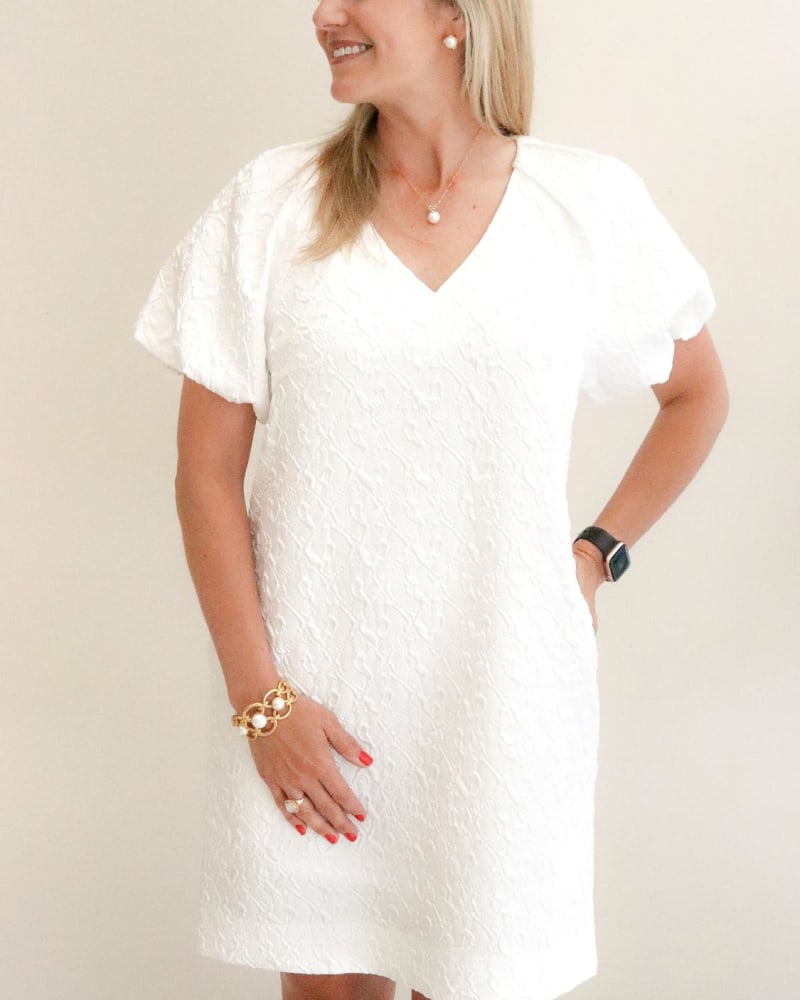 Front of a model wearing a size Large Puff Sleeve Chemise Dress in White in White by Jade. | dia_product_style_image_id:335095